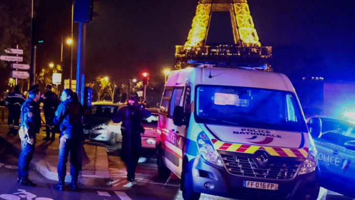 Paris attack: man killed and two hurt in stabbing near Eiffel Tower